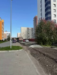 В Берёзовском обновляют дороги в частном секторе и укладывают новый асфальт (видео)